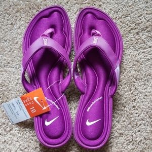Brand new Nike Solarsoft flip flops